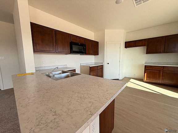 4th image of 7129 E 44th Pl