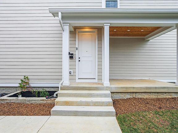 Entrance with covered sitting porch