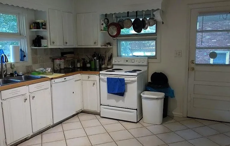 Large kitchen with granite countertops