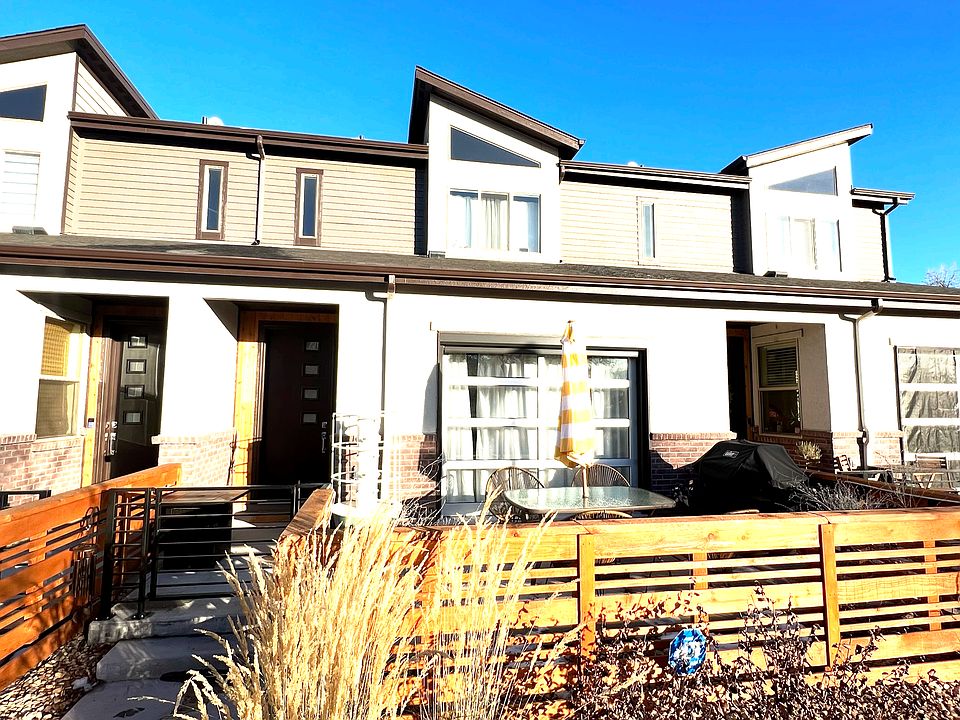 West/sunset-facing front patio with BBQ grill, natural gas hookup, patio misters, and patio lights. Since photo was taken, a new 6-foot fence extension has been added on.