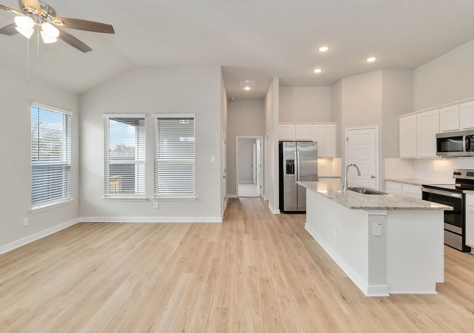 Brand-New 3-Bedroom Emma Park Home with Private Yard & 2-Car Garage — Photo 2