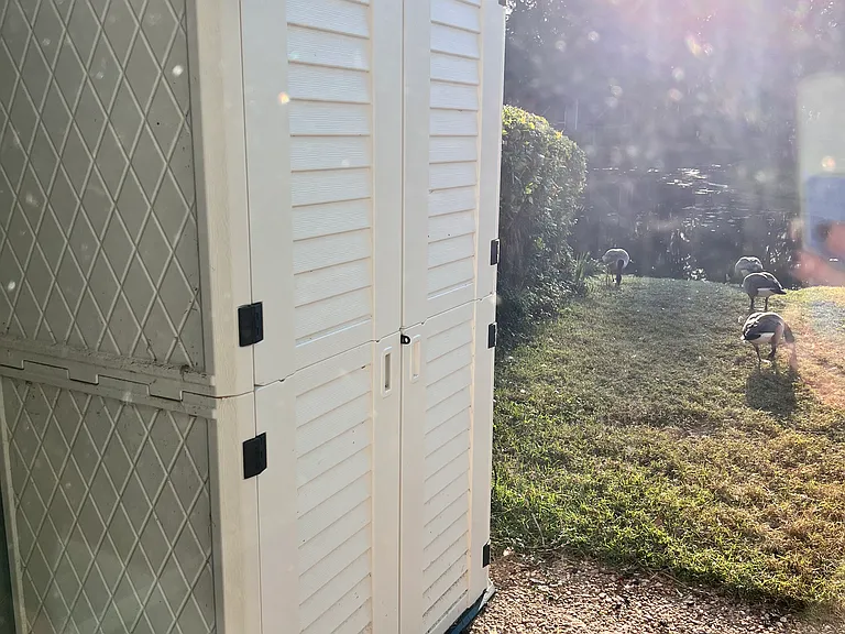 Utility shed included on the back porch.