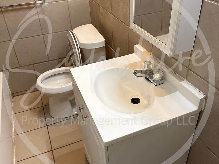5505 Woodland Ave — Photo 10