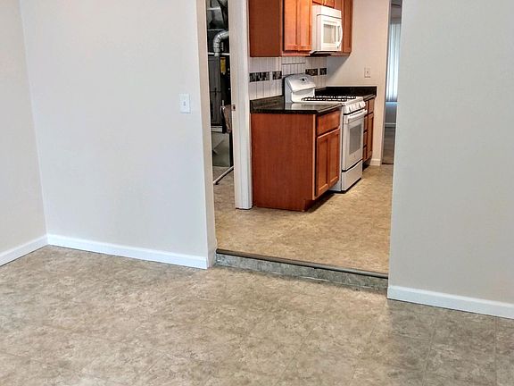 DINING ROOM INTO KITCHEN OR LIVING ROOM INTO KITCHEN
