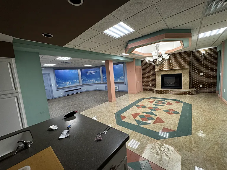 huge living room with vinyl foor