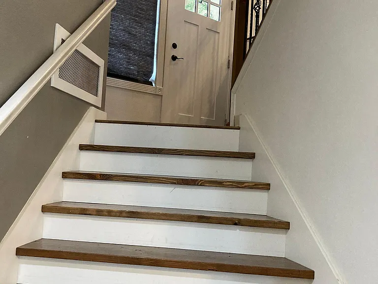 Stairs to middle/garage