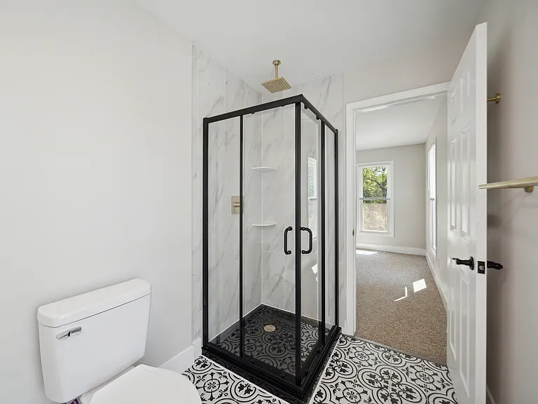 En-Suite Bathroom - Fully Tiled Shower Walls & Floor