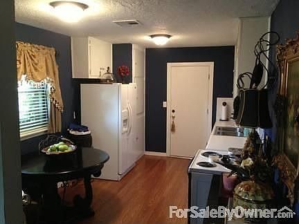 Kitchen
						:
						All white cabinets with lots of storage space