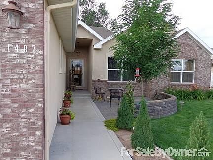 Front of Home
						:
						Front door patio area