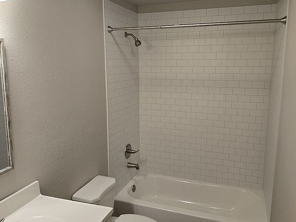 All new tub, surround, vanity and linen closet