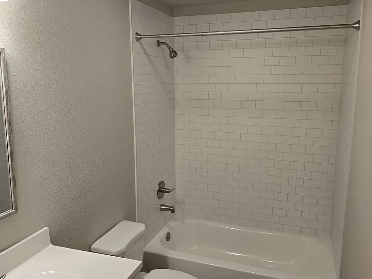 All new tub, surround, vanity and linen closet