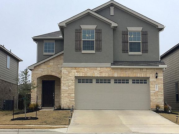 This lovely home features beautiful hardwood and tile floors