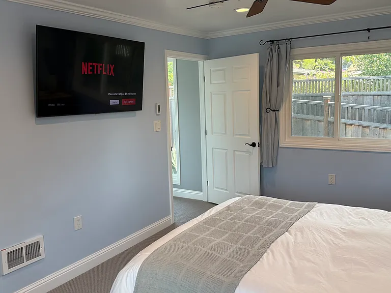 Queen bedroom, including smart TV
