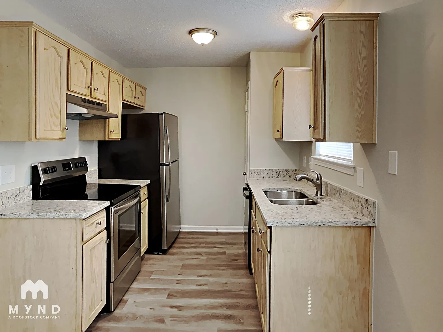 3 bed, 2.0 bath, 1076 sqft, $1,405 — Photo 3