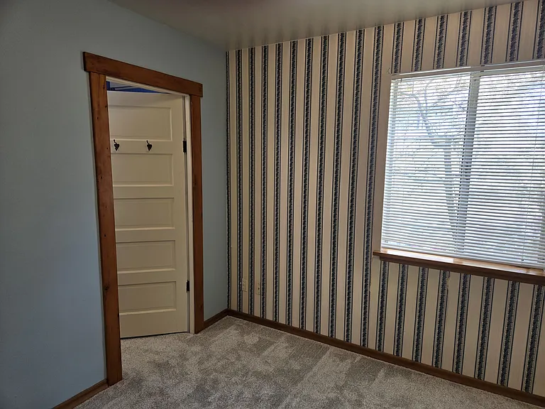 Back Bedroom, open door to Powder Room/Closet.