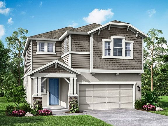 Sebring English Country elevation B with stone only at Bridgewater by William Ryan Homes Tampa