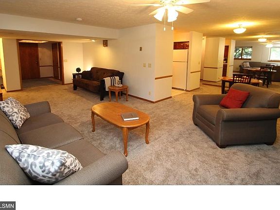 Spacious living room and dining areas. New carpet and fresh paint.