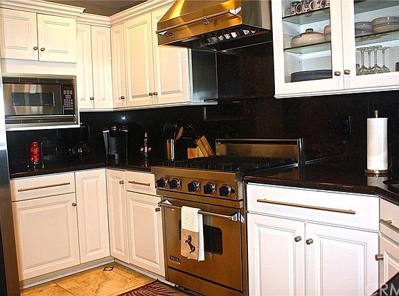 Chef's dream kitchen complete with stainless Viking oven, range, and hood