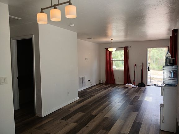 Photo from kitchen, dinning room to the front door and living room.