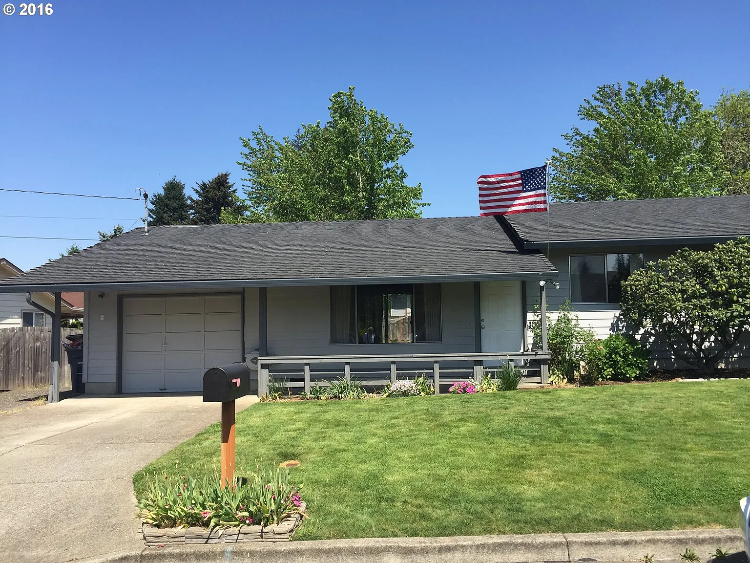 1037 NW Rachel St photo 1