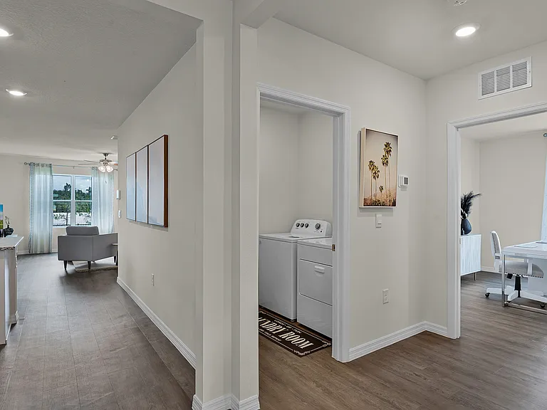 Functional layout with in-home laundry and flex room.