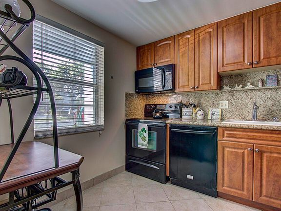 4th image of 7797 Golf Circle Drive #103