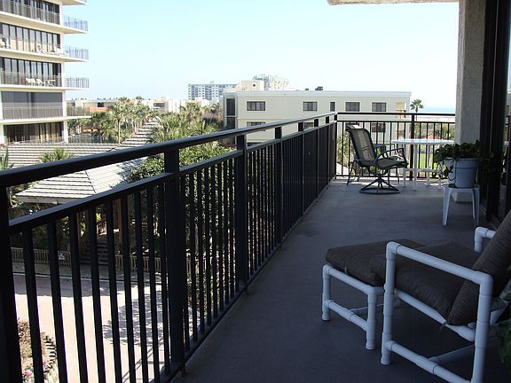 Wrap around balcony provides shade and sun!