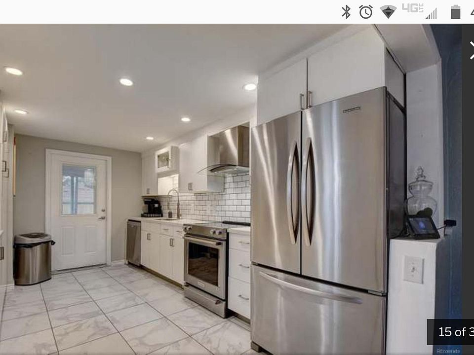 Updated kitchen with access to laundry and driveway with included garage parking.