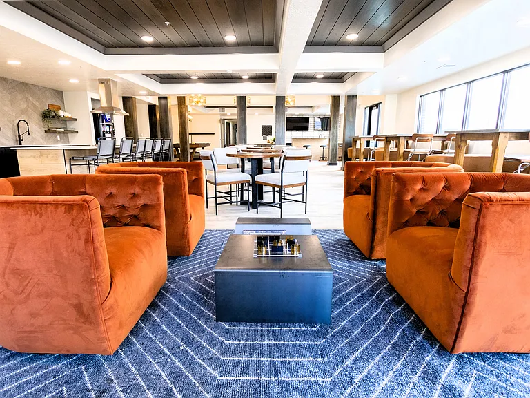 Modern clubhouse designed for gathering, relaxing, and living your best lifestyle.