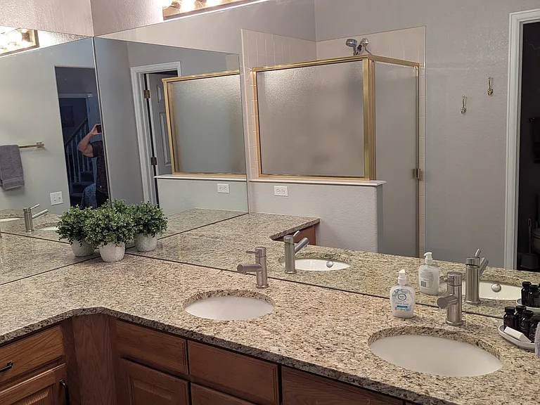 Double vanities, granite counters, LVP and walk in shower
