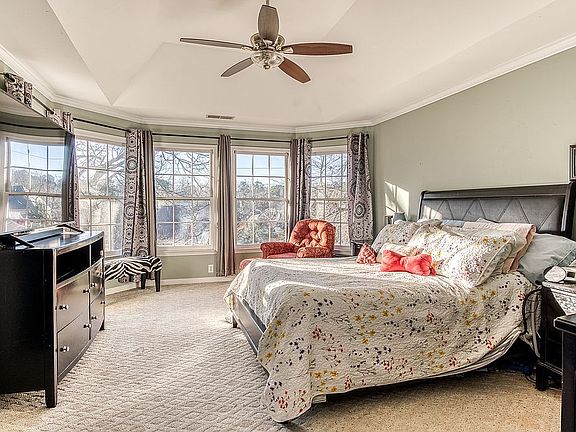 Master bedroom w/ seating