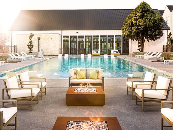 Gather with friends around the outdoor fire pit, creating warm memories on cool nights.