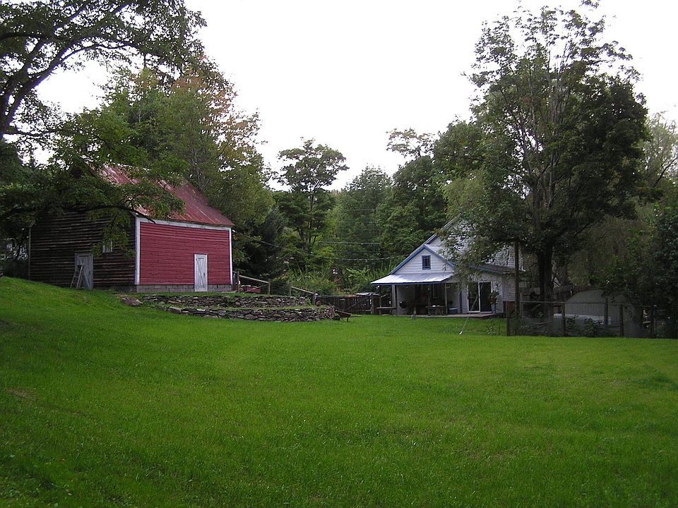 View from back or property of barn and house.