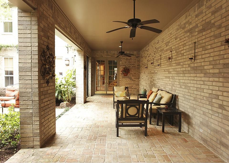 Covered patio from entry sides spacious courtyard that is perfect for outdoor entertaining!