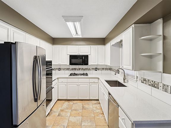 5th image of 310 SE 7th St