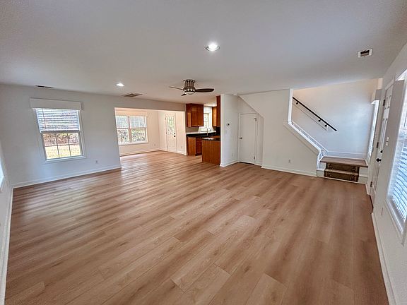 Brand new flooring and blinds.