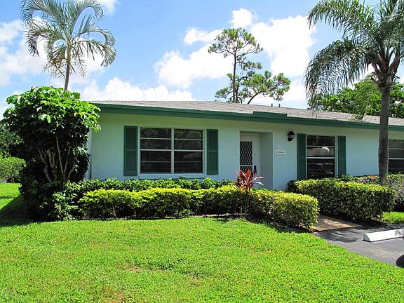 Front view of spacious  corner villa