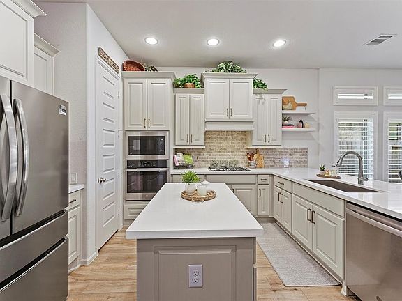 4th image of 5215 Egret Gable Court