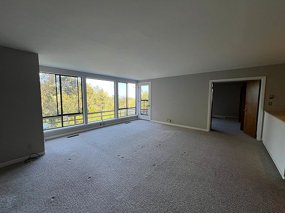 Spacious Living Room with Deck Access