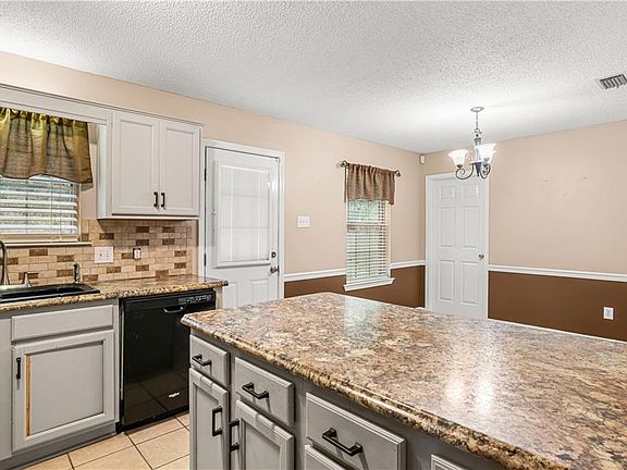 4th image of 6332 Woodside Dr N