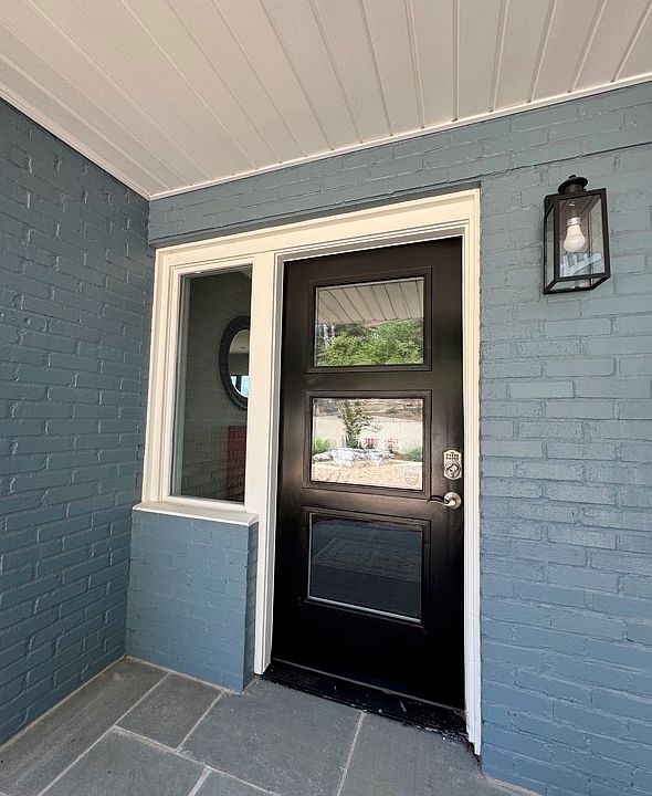 Cute cottage covered entrance to the home
