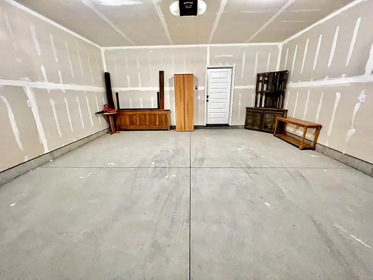 The attached 2 car garage had a large shoe closet.