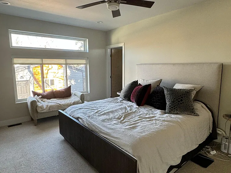 Primary suite 1, with two large walk in closets and en-suite bathroom.