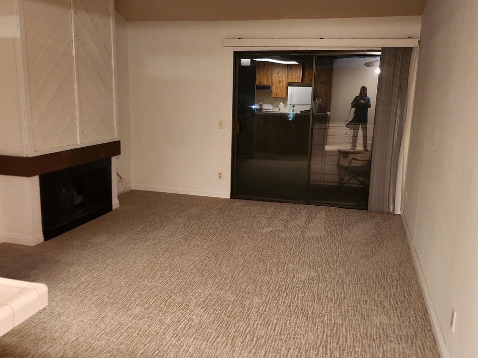 Living room with sliding glass door to outside balcony