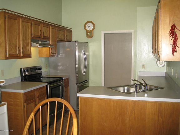 5th image of 3158 Sweetwater Oaks Dr N