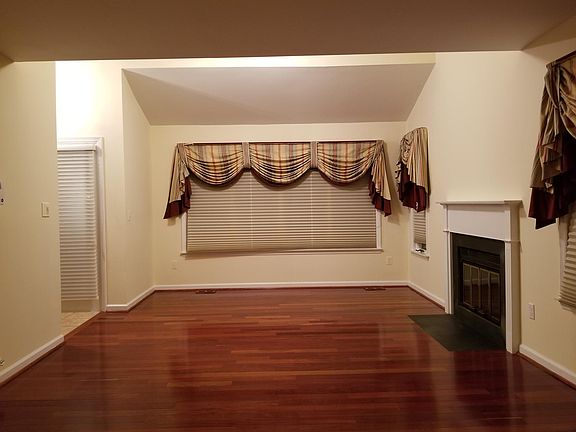 20x13 Living room Fireplace and Plenty of Windows