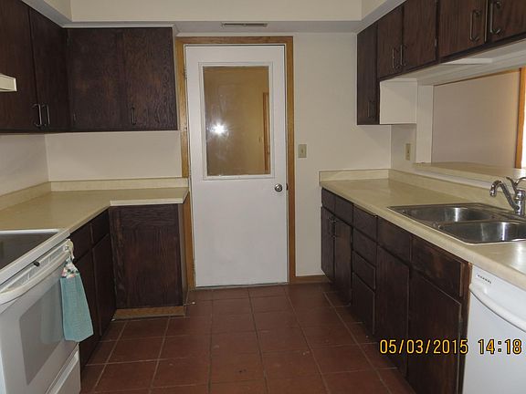 Kitchen with door to foyer.