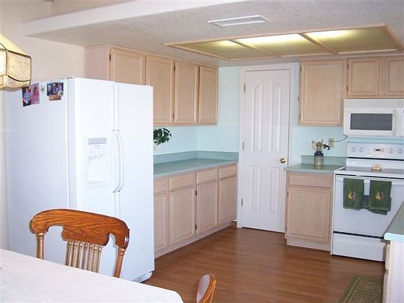 Kitchen with laminate wood flooring