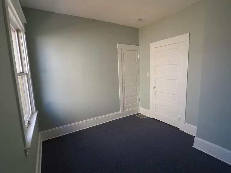 Downstairs bedroom (very small closet) - makes a good guest room or office
