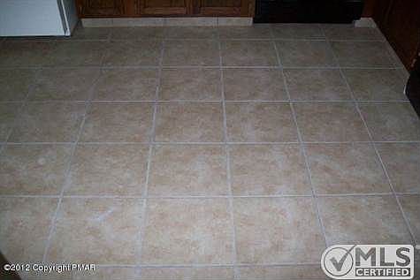 New tile in foyer & kitchen